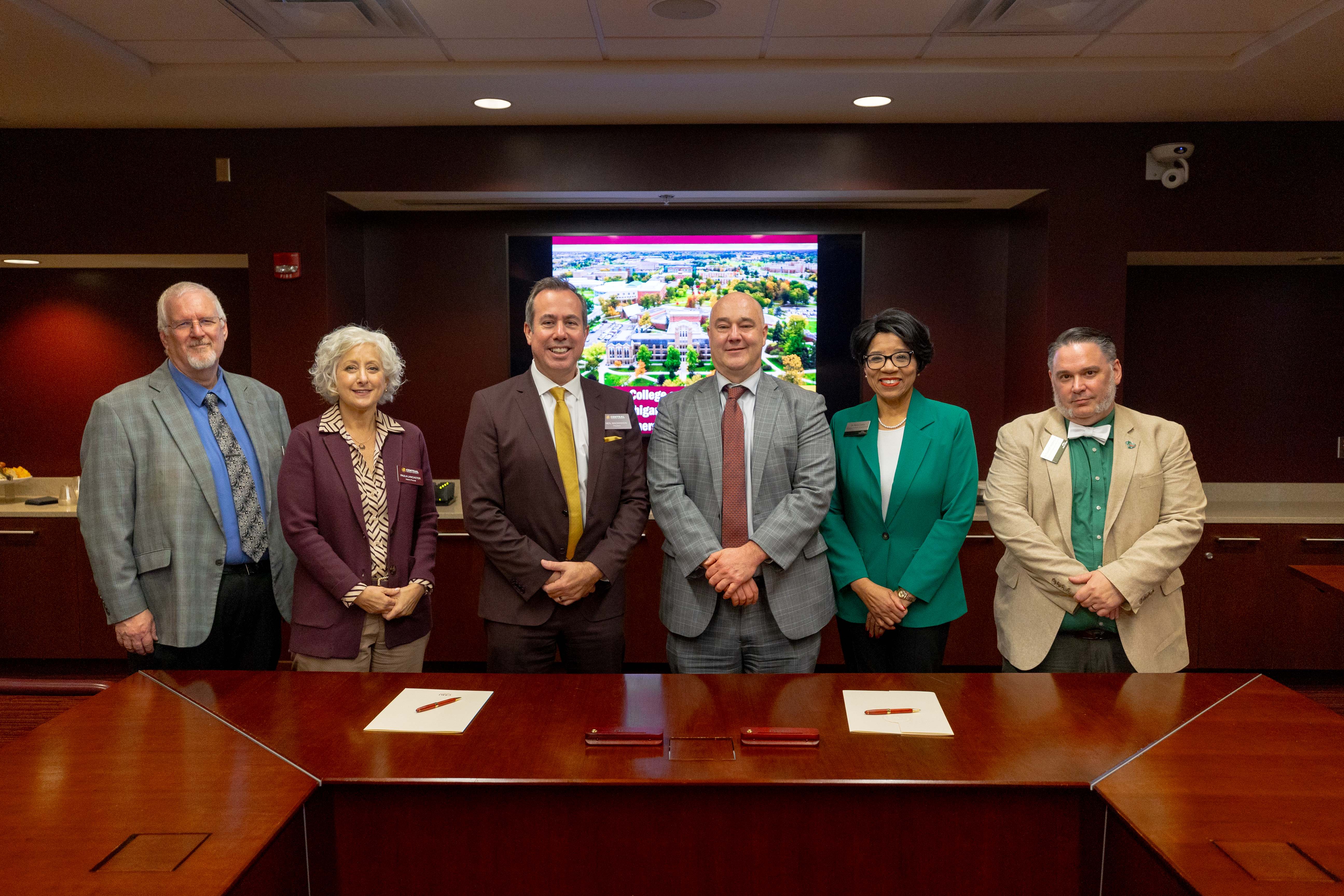 Delta College's Dr. Gavin, Dr. Curry, and Dr. Hopkins with CMU's Dr. McKinnon and representatives at new articulation agreement signing event