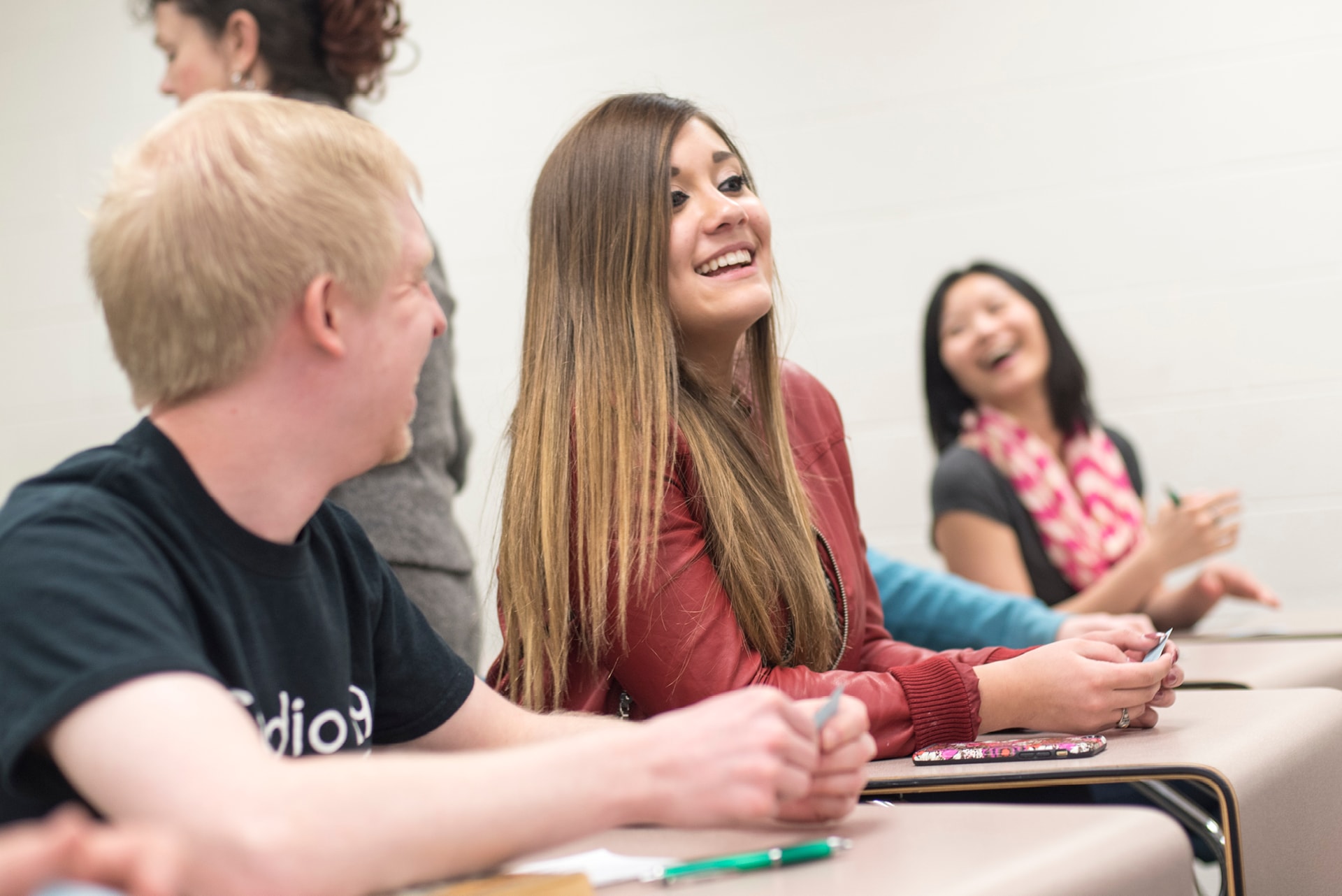 Woman in classroom with other students